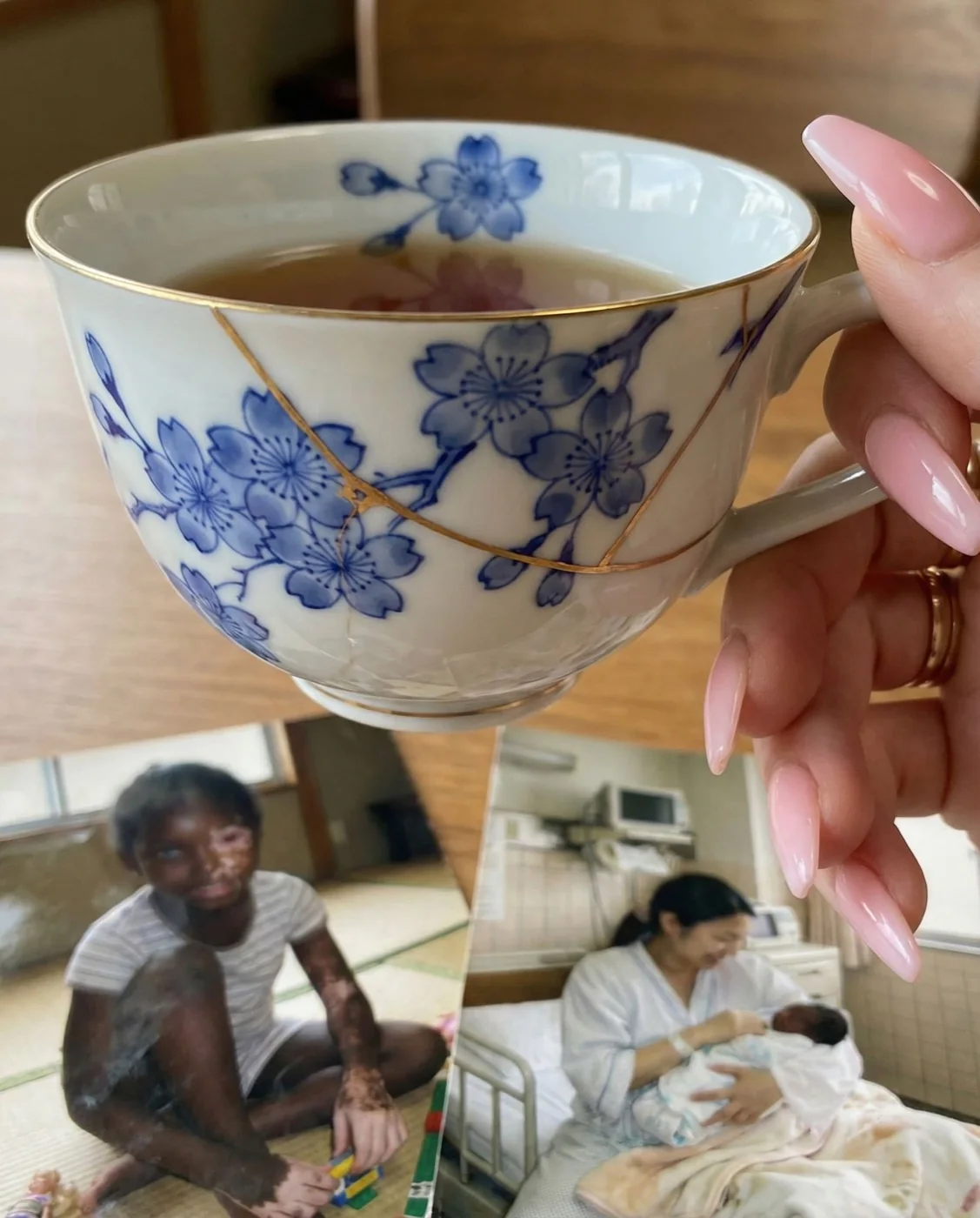 A Japanese porcelain teacup repaired with visible golden kintsugi seams